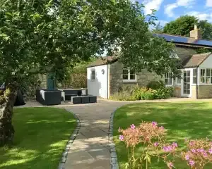 Two Bedroom Cottage with private garden ideal for two couples, families and friends.